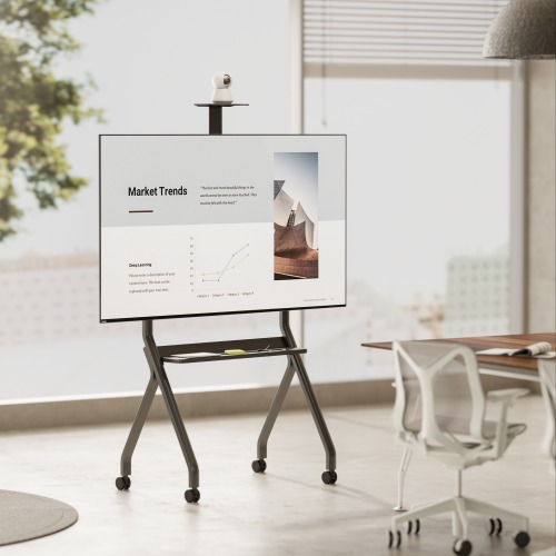 A sleek mobile display stand showing market trends in a modern office.