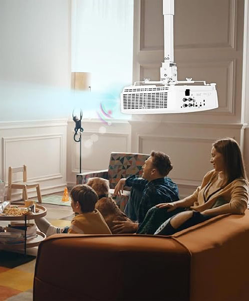 Family watching a ceiling-mounted projector in a cozy living room.